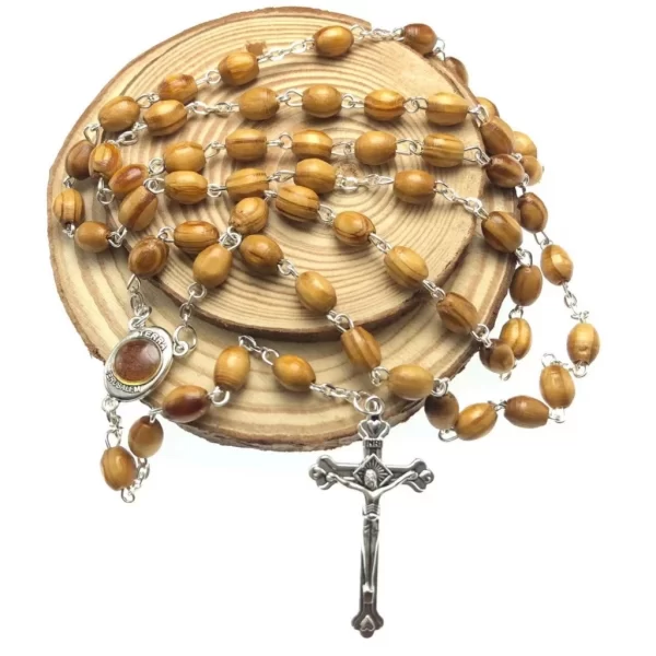 Rosary with Wooden Beads and Carved Cross Pendant: A Sacred Expression of Faith and Devotion