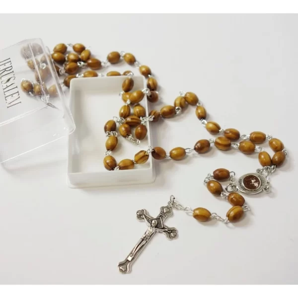 Rosary with Wooden Beads and Carved Cross Pendant: A Sacred Expression of Faith and Devotion